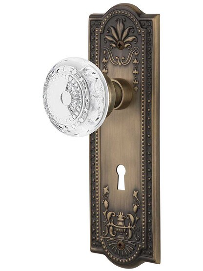 Meadows Door Set with Keyhole and Matching Crystal-Glass Knobs in Antique Brass.